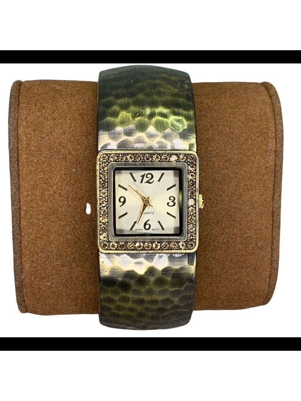 QUARTZ gold tone bangle clamper watch